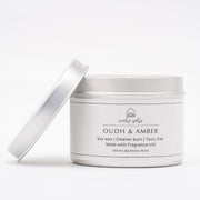 Silver candle jar with lid on a white background